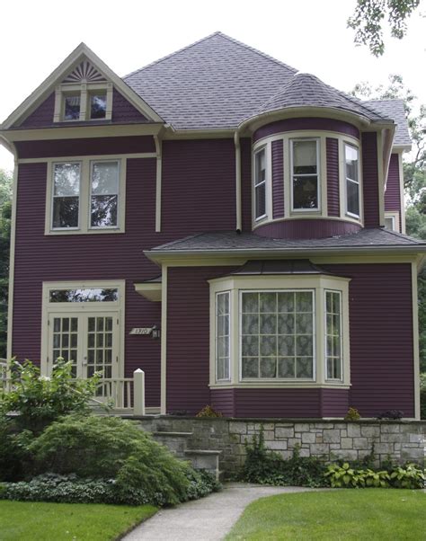 purple house with black metal roof|purple house exterior.